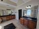 A bathroom exhibiting a double vanity with granite countertops and a dedicated makeup area at 4520 Mossey Dr, Lithonia, GA 30038