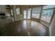 This breakfast nook boasts hardwood floors, natural light, and views of the backyard at 4520 Mossey Dr, Lithonia, GA 30038