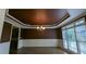 Dining room featuring decorative trim and chandelier at 4520 Mossey Dr, Lithonia, GA 30038