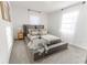 Serene bedroom with soft carpet, neutral tones, and natural light from two large windows at 4776 Ballew Dr, Powder Springs, GA 30127