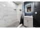 Modern bathroom featuring gray and white tile, a modern vanity, and a glass shower at 5956 Henley Dr, Powder Springs, GA 30127