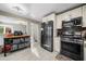 Bright and airy kitchen with stainless steel appliances and tile floors at 1793 Shelley Ne Ct, Marietta, GA 30062