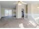 Open-concept living space featuring a kitchen with white appliances and a dining area at 6138 Raleigh Oaks Ct, Lithonia, GA 30058