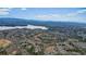 An aerial view showing the area's proximity to the lake and mountains at 616 Redwood Ln, Canton, GA 30114