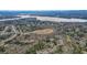 A distant aerial view shows the community's closeness to the lake at 616 Redwood Ln, Canton, GA 30114