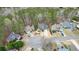 An aerial view shows the home in cul-de-sac and tree-lined neighborhood at 616 Redwood Ln, Canton, GA 30114