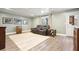 Finished basement featuring a comfortable seating area, wet bar, and ample space for relaxation and entertainment at 616 Redwood Ln, Canton, GA 30114