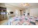 Cozy bedroom featuring a desk, and a patterned quilt, perfect for a relaxing retreat at 616 Redwood Ln, Canton, GA 30114