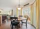 Eat-in kitchen dining area has bay windows and leads to living room at 616 Redwood Ln, Canton, GA 30114