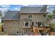 This home features an inviting deck, a charming bay window, and a meticulously maintained exterior in a desirable neighborhood at 616 Redwood Ln, Canton, GA 30114