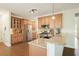 Kitchen features granite countertops, stainless steel appliances, and hardwood floors at 616 Redwood Ln, Canton, GA 30114