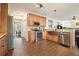 Spacious kitchen featuring stainless steel appliances, granite countertops, and wooden cabinetry at 616 Redwood Ln, Canton, GA 30114
