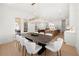 Dining room and open kitchen with view of the backyard at 929 Keystone Dr, Woodstock, GA 30188