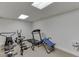 Basement fitness area with exercise equipment and neutral carpet at 1615 Creek Pointe Cir, Lawrenceville, GA 30043