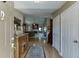 Welcoming entryway featuring hardwood floors and an open floor plan leading into the living room at 1615 Creek Pointe Cir, Lawrenceville, GA 30043