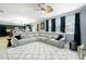 Spacious living area open to the kitchen, featuring comfortable seating and ample natural light at 977 Forest Knoll Ct, Lithia Springs, GA 30122