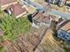 A high angle view of a home and backyard, featuring a new concrete patio at 2143 Great Shoals Cir, Lawrenceville, GA 30045