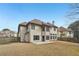 Spacious backyard with privacy fence and patio, perfect for outdoor entertaining at 2143 Great Shoals Cir, Lawrenceville, GA 30045