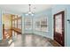 Cozy breakfast nook features multiple windows, and a view to an open floorplan at 2143 Great Shoals Cir, Lawrenceville, GA 30045