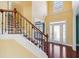 Elegant foyer with high ceilings and hardwood floors at 2143 Great Shoals Cir, Lawrenceville, GA 30045