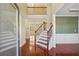 Grand foyer with hardwood floors and staircase leading to upper level at 2143 Great Shoals Cir, Lawrenceville, GA 30045