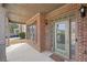 Inviting front porch with brick accents, perfect for relaxing outdoors at 2143 Great Shoals Cir, Lawrenceville, GA 30045