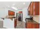 Stylish kitchen featuring stainless steel appliances, granite countertops, and breakfast bar at 2143 Great Shoals Cir, Lawrenceville, GA 30045