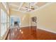 Bright living room featuring hardwood floors, coffered ceilings, and open layout at 2143 Great Shoals Cir, Lawrenceville, GA 30045