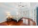 Large main bedroom with wood floors, tray ceilings, and plenty of natural light at 2143 Great Shoals Cir, Lawrenceville, GA 30045