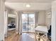 Balcony area with floor-to-ceiling doors, desk, and a serene view of the outdoors at 2657 Lenox Rd # C30, Atlanta, GA 30324