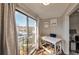Balcony area with floor-to-ceiling doors, desk, and outdoor view at 2657 Lenox Rd # C30, Atlanta, GA 30324