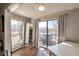 View of balcony area with floor-to-ceiling doors, and outdoor view at 2657 Lenox Rd # C30, Atlanta, GA 30324