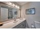 Bright bathroom with large mirror, modern vanity, and walk-in shower with glass door at 2657 Lenox Rd # C30, Atlanta, GA 30324