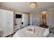 Bedroom features a large bed with a walk-in closet and an ensuite bathroom at 2657 Lenox Rd # C30, Atlanta, GA 30324