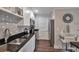 Updated kitchen showcases granite countertops, stainless steel appliances, and modern fixtures at 2657 Lenox Rd # C30, Atlanta, GA 30324
