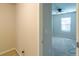 Bedroom featuring neutral carpet, a ceiling fan, and a walk-in closet at 3293 Pennington Dr, Stonecrest, GA 30038