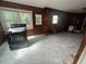 Spacious kitchen area awaiting renovation, featuring a window and an exterior door at 1907 Langston Sw Ave, Atlanta, GA 30310