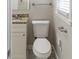 Small half-bath with modern fixtures and granite countertop at 2592 Miriam Ln, Decatur, GA 30032