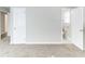 Carpeted bedroom with neutral paint and en suite bathroom at 2592 Miriam Ln, Decatur, GA 30032