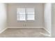 Comfortable bedroom with plush carpeting and natural light from window at 2592 Miriam Ln, Decatur, GA 30032