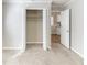 Bedroom with large closet space and view to the kitchen area at 2592 Miriam Ln, Decatur, GA 30032