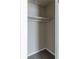 A simple closet with a single shelf and rod at 2592 Miriam Ln, Decatur, GA 30032