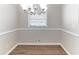 Bright dining room with hardwood floors and ample natural light at 2592 Miriam Ln, Decatur, GA 30032