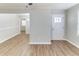 Inviting living room with hardwood floors and a view of the dining area at 2592 Miriam Ln, Decatur, GA 30032