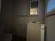 Bathroom with vanity and mirror and covered window at 2955 Preston Dr, Rex, GA 30273