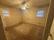 Bedroom with carpeted floors, ceiling fan, and window at 2955 Preston Dr, Rex, GA 30273