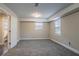 Carpeted room with neutral walls and natural light at 2304 Wesley Chapel Rd, Decatur, GA 30035