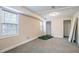 Bedroom with carpet flooring and a window for natural light at 2304 Wesley Chapel Rd, Decatur, GA 30035
