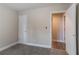 A bedroom featuring neutral walls and carpeted floors at 2304 Wesley Chapel Rd, Decatur, GA 30035