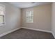 A standard bedroom with a window providing natural light at 2304 Wesley Chapel Rd, Decatur, GA 30035